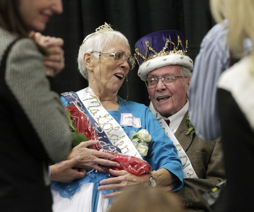 Al Hartmann  |  The Salt Lake Tribune 
Crowds gather around Lothele Davis, a resident of Copper Ridge Healthcare, and Martin "Marty" Smart, a resident of Woodland Park Care Center, as they are crowned as the new Mr. and Ms. Golden Years 2013 at the Utah Healthcare  Association's 17th annual Mr. and Ms. Golden Years Pageant at the South Towne Expo Center in Sandy Tuesday September 24. It was an inner-and-outer beauty pageant for residents of Utahís long-term care facilities. Contestants ranged in age from the mid-60s to 90-plus years old