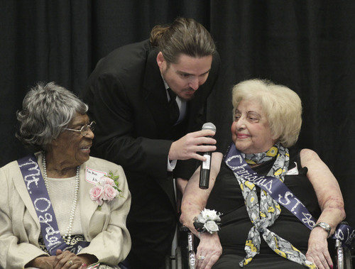 Al Hartmann  |  The Salt Lake Tribune 
Entertainer Andrew Gill sings an old show tune with Eva Mae Albert, left, and Lillian Odea during the Utah Healthcare  Association's 17th annual Mr. and Ms. Golden Years Pageant at the South Towne Expo Center in Sandy Tuesday September 24. It was an inner-and-outer beauty pageant for residents of Utah's long-term care facilities. Contestants ranged in age from the mid-60s to 90-plus years old
