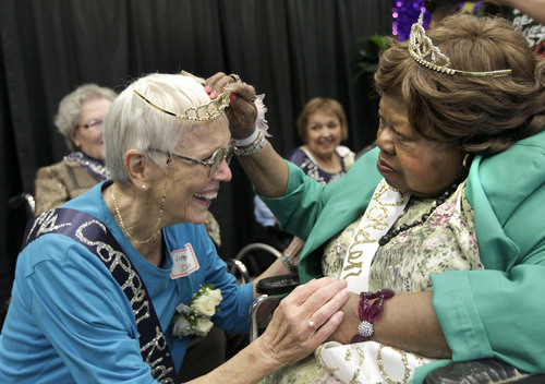 Al Hartmann  |  The Salt Lake Tribune 
Lothele Davis, left, is crowned as the new Ms. Golden Years 2013 by outgoing 2012 Ms. Golden Years Ms. Gerorgia Harper at the Utah Healthcare  Association's 17th annual Mr. and Ms. Golden Years Pageant at the South Towne Expo Center in Sandy Tuesday September 24. It was an inner-and-outer beauty pageant for residents of Utah's long-term care facilities. Contestants ranged in age from the mid-60s to 90-plus years old