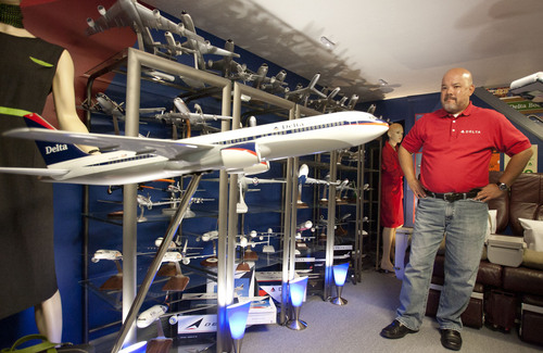 Steve Griffin  |  The Salt Lake Tribune

Longtime Delta Air Lines flight steward, Perry de Vlugt, with his Delta Air Lines model collection in his seven-room basement in Salt Lake City, Friday, Sept. 20, 2013. He has turned the entire basement into a museum of old Delta memorabilia, complete with a lavatory from an old plane.