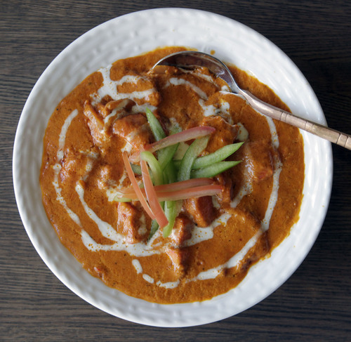 Al Hartmann  |  The Salt Lake Tribune
Copper Bowl's Chicken Tikka Masala, served with rice and multi-layered whole wheat bread.