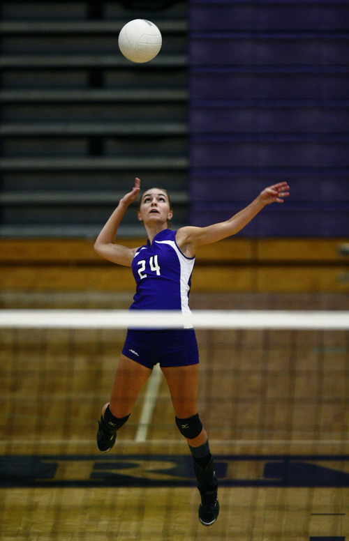 Chris Detrick  |  The Salt Lake Tribune
Lehi's Ashley Robbins (24) serves the ball during the game at Riverton High School Thursday September 26, 2013.