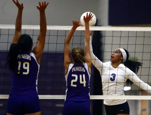 Chris Detrick  |  The Salt Lake Tribune
Riverton's Tiena Afu (3) attempts to spike the ball past Lehi's Ashley Robbins (24) and Lehi's Faitoto'a Faleao (19) during the game at Riverton High School Thursday September 26, 2013.