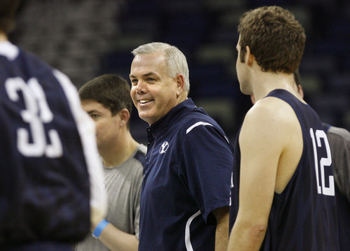 Scott Sommerdorf  |  The Salt Lake Tribune
BYU head coach Dave Rose laughs with his players during practice at the New Orleans Arena, Wednesday, March 23, 2011.