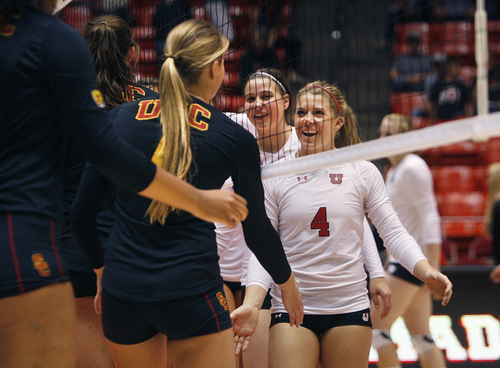 Scott Sommerdorf   |  The Salt Lake Tribune
Utah's Tess Sutton (#4) leads a group of Utes to congratulate USC on their three-set sweep of Utah. Utah lost to USC, 25-22, 25-21, and 25-13, Sunday, September 29, 2013