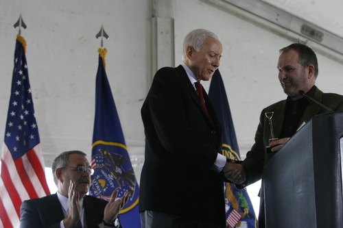 Trent Nelson | The Salt Lake Tribune
Sen. Orrin Hatch, left, receives a minature golden shovel from Harvey Davis, director for installations and logistics at the National Security Agency, during the groundbreaking ceremony for the Utah Data Center on Jan. 6, 2011.