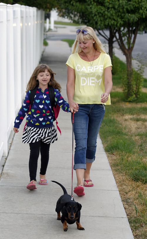 Al Hartmann  |  The Salt Lake Tribune
Nathan Adams used an international dating website to find the woman of his dreams, Elena Adamchiyk.  She's from Ukraine. She arrived in Utah this month.  Elena walks Nathan's 6-year-old daughter, Vanessa,  to school.