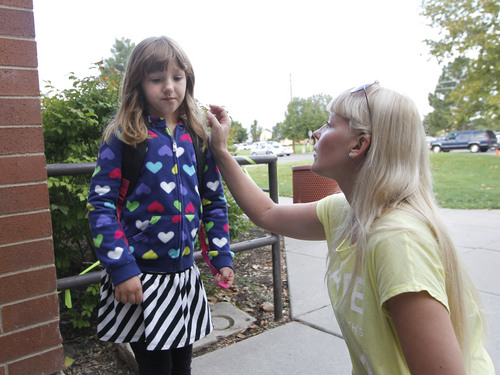 Al Hartmann  |  The Salt Lake Tribune
Nathan Adams used an international dating website to find the woman of his dreams, Elena Adamchiyk.  She's from Ukraine. She arrived in Utah this month.  Elena walks Nathan's 6-year-old daughter, Vanessa,  to school.