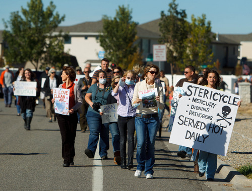 Trent Nelson  |  The Salt Lake Tribune
Alicia Connell and Pamela Beheshti lead North Salt Lake residents and activists on a protest march to the controversial medical-waste incinerator Stericycle, in North Salt Lake on Saturday.
