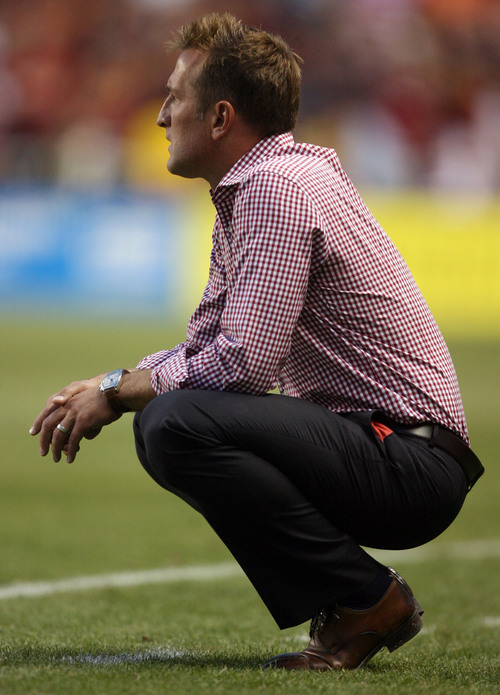 Steve Griffin | The Salt Lake Tribune

Real Salt Lake head coach, Jason Kreis, keeps an eye on the action  during first half action of the RSL vs. Portland U.S. Open Cup semifinals soccer game at Rio Tinto Stadium in Sandy, Utah Wednesday August 7, 2013.