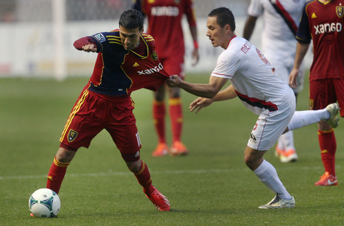 Steve Griffin | The Salt Lake Tribune


Atlanta's Pedro Mendes can only grab the jersey of Real's Javier Morales during the Real Salt Lake versus Atlanta soccer game at Rio Tinto Stadium in Sandy, Utah Tuesday May 28, 2013.