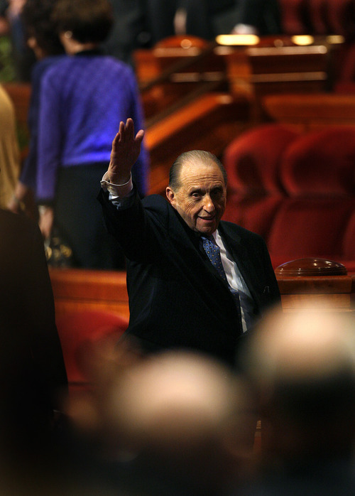 Scott Sommerdorf   |  The Salt Lake Tribune
LDS President Thomas S. Monson waves to the audience as he leaves the stage after speaking to end the morning session of the second day of the 183rd LDS General Conference, Sunday, April 7, 2013.