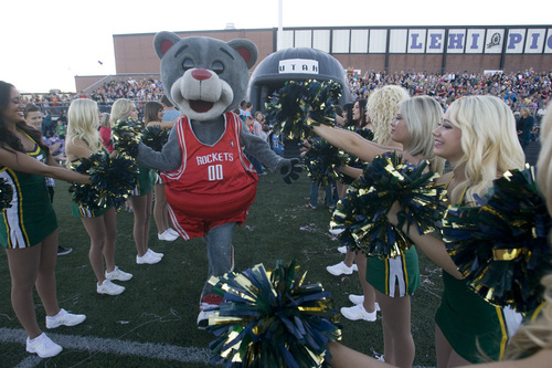 Rick Egan  | The Salt Lake Tribune 

Houston Rocket's mascot, Clutch, enters the field before the Mascot bowl at Lehi High, Monday, September 30, 2013.