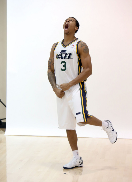 Francisco Kjolseth  |  The Salt Lake Tribune
Trey Burke of the Utah Jazz hams it up for Media Day at the Zions Bank Basketball Center in Salt Lake on Monday, Sept. 30, 2013, as they get their official team pictures taken and are interviewed by the media.