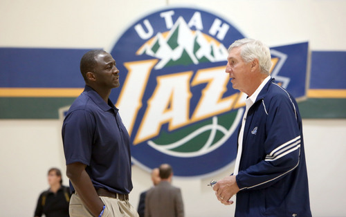 Francisco Kjolseth  |  The Salt Lake Tribune
Tyrone Corbin, left, head coach of the Utah Jazz speaks with former coach Jerry Sloan during Media Day at the Zions Bank Basketball Center in Salt Lake on Monday, Sept. 30, 2013.