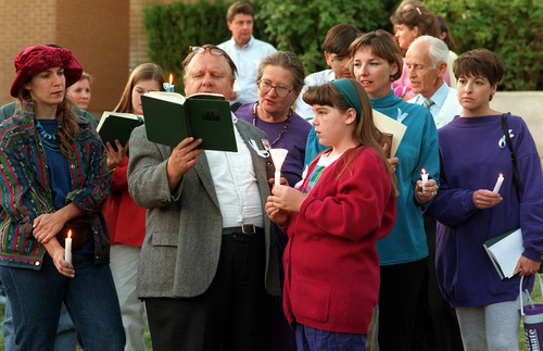 Al Hartmann  |  The Salt Lake Tribune

Supporters of Lynne Whitesides hold a vigil outside her LDS Church disciplinary hearing in 1993.