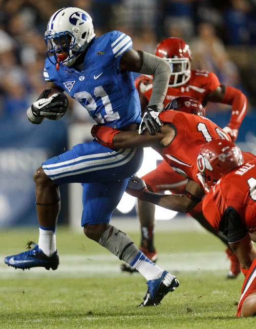 Trent Nelson  |  The Salt Lake Tribune
Brigham Young Cougars running back Jamaal Williams (21) runs the ball in the second quarter as the BYU Cougars host the Utah Utes, college football Saturday, September 21, 2013 at LaVell Edwards Stadium in Provo.