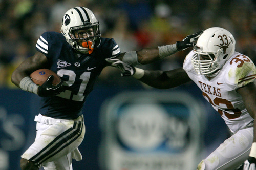 Rick Egan  | The Salt Lake Tribune 

Brigham Young Cougars running back Jamaal Williams (21) gets past Texas Longhorns linebacker Steve Edmond (33) in the Cougars 40-21 win over the University of Texas at Lavell Edwards stadium, Saturday, September 7, 2013.