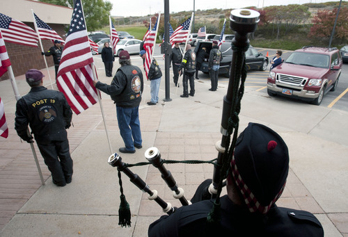 Steve Griffin  |  The Salt Lake Tribune

Patriot Guard members hold flags during the Utah volunteers of the Missing In America Project's Military Funeral Service for 11 unclaimed  Utah veterans (and one spouse) whose remains have been in the care of two area mortuaries at the Utah Veterans Cemetery and Memorial Park in Bluffdale, Utah Thursday, October 3, 2013.