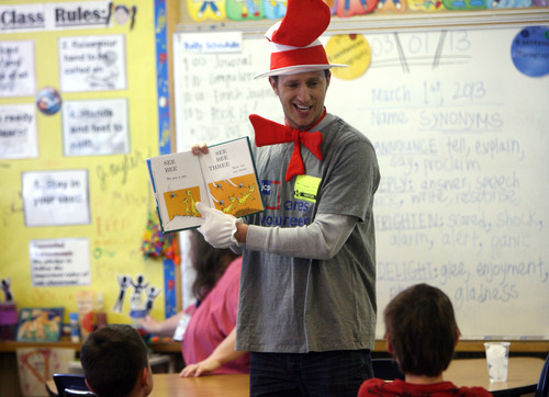 Steve Griffin | The Salt Lake Tribune


Dressed as The Cat in the Hat, Jason McRae, of JC Penny Shared Services, reads to Jamie Oyler's class at Oquirrh Hills Elementary school in Kearns on Friday March 1, 2013. Volunteers were at the school reading Dr. Seuss books to students to celebrate the author's birthday.