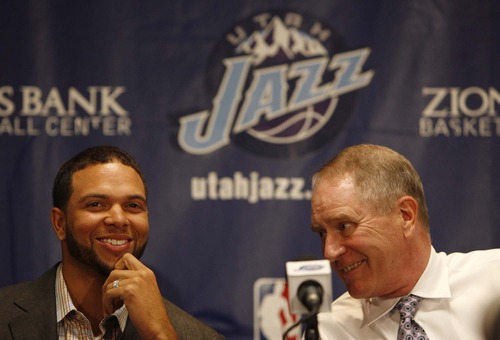 Trent Nelson  |  The Salt Lake Tribune

Utah Jazz point guard Deron Williams signed a multi-year contract extension with the team Friday, July 18, 2008. At right is team General Manager Kevin O'Connor.