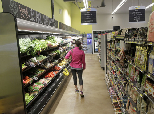 Al Hartmann  |  The Salt Lake Tribune
A customer checks out the organic vegetable aisle at Real Foods Market in Sugar House. It is the first retail outlet in the state to sell raw (unpasteurized) milk.