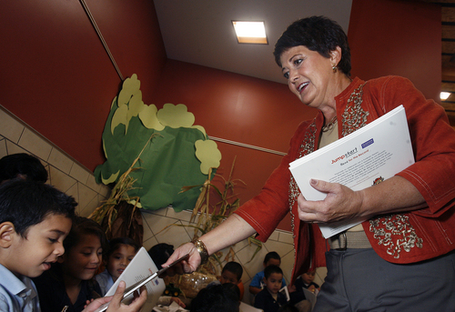 Scott Sommerdorf   |  The Salt Lake Tribune
Utah's First Lady Jeanette Herbert hands out copies of "Otis" by author Loren Long to Sini Malei's pre-kindergarten class at Mountain View Elementary as part of Jumpstart's "Read for the Record" program presented in partnership with the Pearson Foundation, Thursday, October 3, 2013.