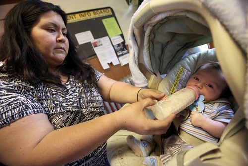 Francisco Kjolseth  |  Tribune file photo
Alejandra Castro, 34, shows up at the Crossroads Urban Center in Salt Lake with her 6-week-old Alejandro Ruz in hopes of getting baby formula for her son on Wednesday. With the federal shutdown taking effect, the repercussions are being manifest from the bottom up as women who rely on the federally funded WIC (Women, Infants and Children) are unable to get baby formula. Emergency funding came through Thursday that will keep WIC open through October.