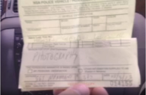 Anthony Gucciardi shows the written warning he received from NSA security for entering and filming the parking lot of the Utah Data Center on Oct. 3, 2013. 
Courtesy Anthony Gucciardi