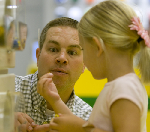 Rick Egan  | The Salt Lake Tribune 

Nick Callister plays with LEGOs along with his daughter Kate, 5, at the new LEGO store at the Fashion Place Mall, Wednesday, Oct. 2, 2013.