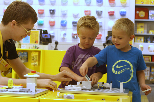 Rick Egan  | The Salt Lake Tribune 

Eric Sagaser, brick specialist, assists 5-year-olds Dylan Harrison and J. Jessop as they play with LEGOs at the new LEGO store at the Fashion Place Mall, Wednesday, Oct. 2, 2013.