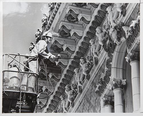 Ross Welser  |  Tribune File Photo
Fred Jex cleans the facade at the Capitol Theatre. June 3, 1977.