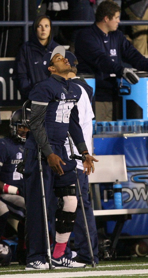 Leah Hogsten | The Salt Lake Tribune
Utah State Aggies quarterback Chuckie Keeton (16) looks to the sky during the second half from the sidelines after his knee injury in the first half.  Brigham Young University Cougars defeatd Utah State University Aggies 31-14, Friday, October 4, 2013 in Logan.
