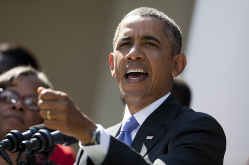 In this Oct. 1, 2013, photo, President Barack Obama gestures during a statement on the government shutdown in the Rose Garden of the White House in Washington. Obama's strategy during the partial shutdown of the federal government is aimed at keeping up the appearance of a leader focused on the public's priorities and avoiding looking tone deaf to the hundreds of thousands of Americans forced off the job. (AP Photo/ Evan Vucci)