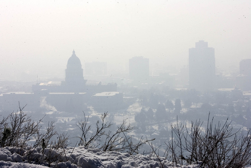 Paul Fraughton  |   Salt Lake Tribune
The Utah State Capitol Building  and the downtown buildings of  Salt Lake City are shrouded  in a thick layer of smog  as the winter inversion continues.
 Tuesday, January 22, 2013