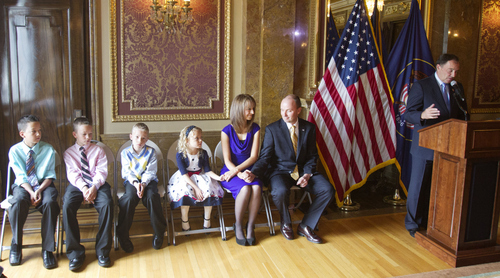 Keith Johnson | The Salt Lake Tribune
 
Utah Rep. Spencer J. Cox, R, Fairview sits with his wife Abby and their four children as Utah Gov. Gary Herbert announces his nomination of Cox for Lt. Governor, October 8, 2013 in Salt Lake City.