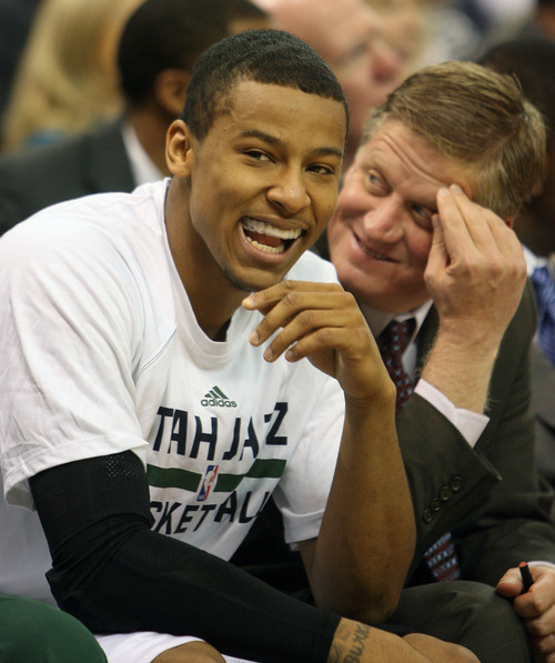 Steve Griffin  |  The Salt Lake Tribune

Utah's Trey Burke laughs from the bench during first half action in the Jazz versus Golden State preseason NBA basketball game at the EnergySolutions Arena in Salt Lake City, Utah Tuesday, October 8, 2013.