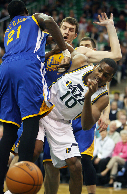 Steve Griffin  |  The Salt Lake Tribune

Utah's Alec Burks fights for the ball during second half action in the Jazz versus Golden State preseason NBA basketball game at the EnergySolutions Arena in Salt Lake City, Utah Tuesday, October 8, 2013.