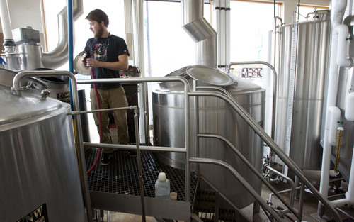 Steve Griffin  |  The Salt Lake Tribune

Epic Brewery brewer,  Jack Kern, works on a batch of beer  at the Salt Lake City, Utah brewery Wednesday, October 2, 2013.