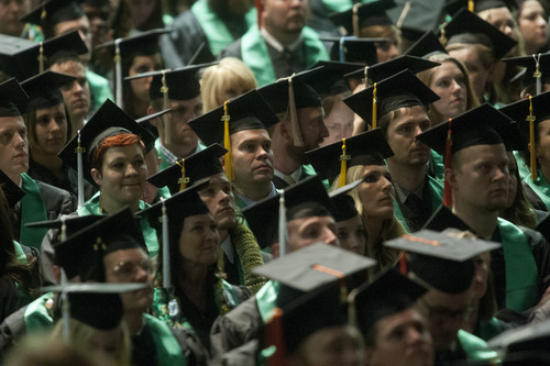 File photo | Chris Detrick  |  The Salt Lake Tribune
Utah Valley University students listen during the Commencement exercises at the UCCU Events Center Thursday April 25, 2013. Gov. Gary Herbert wants 66 percent of Utahns to have some post-secondary education by 2020.
