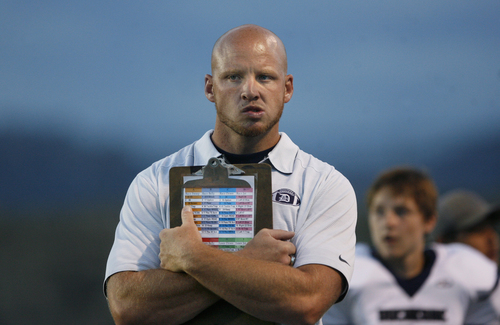 Scott Sommerdorf   |  The Salt Lake Tribune
Duchesne head coach Jerry Cowan paces the sidelines during the first half of their game at Carbon High in Price, Friday, September 6, 2013. Duchesne beat Carbon 35-0 for their 37th win in a row and set the Utah state record for consecutive wins.