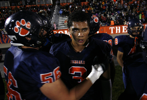 Scott Sommerdorf   |  The Salt Lake Tribune
Brighton RB Osa Masina takes a breather on the sidelines after gaining 242 yards and getting the wind knocked out of him against Alta. Brighton defeated Alta 38-28, Friday, September 27, 2013