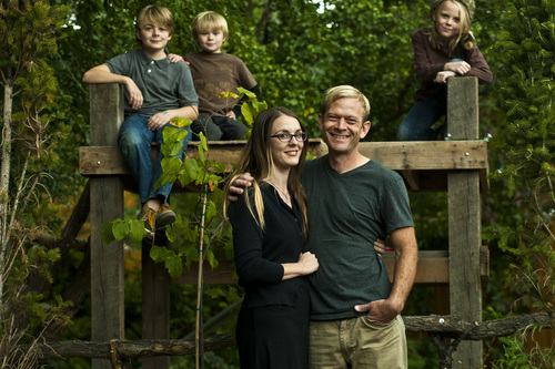 Chris Detrick  |  The Salt Lake Tribune
Phil Sherburne and his wife Leia Bell pose for a portrait with their kids Cortez, 11, Oslo, 6, and Ivan, 9, at their home in Salt Lake City Wednesday October 9, 2013. Sherburne and Bell, owners of the frame and art store called Signed & Numbered, succeeded on Oct. 5 in signing up for health coverage on healthcare.gov.