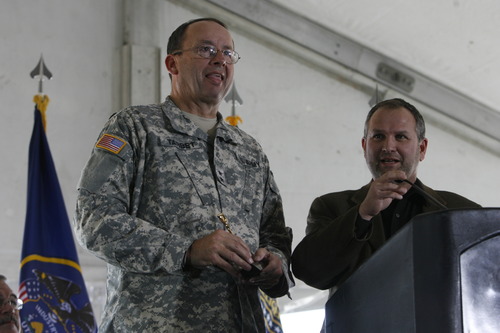 Trent Nelson | The Salt Lake Tribune
Then-Utah National Guard Gen. Brian Tarbet (left) speaks with Harvey Davis, director for installations and logistics at the National Security Agency, during the groundbreaking ceremony for the Utah Data Center on Jan. 6, 2011.