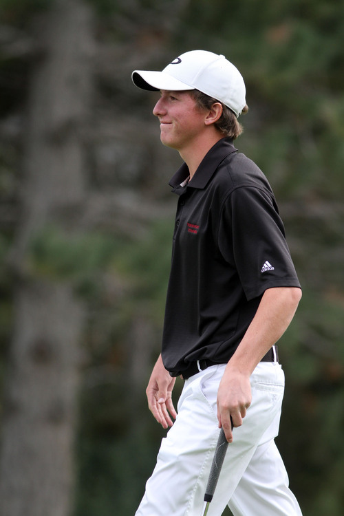Francisco Kjolseth  |  The Salt Lake Tribune
Kelton Hirsch of Viewmont is all smiles after winning the 5A boys' state golf tournament at the Alpine Country Club in Highland on Tuesday, Oct. 8, 2013.