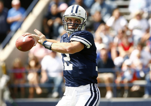 Provo, UT--9/9/06--2:30:30 PM-
BYU QB John Beck looks to pass during the 1st quarter.

****
*1st quarter*
BYU's home opener against Tulsa at LaVell Edwards Stadium. Kurt Kragthorpe's brother, Steve, is the head coach at Tulsa, so a shot or two of him would be nice. Otherwise, game action ... and lots of it.

Chris Detrick/Salt Lake Tribune
File #_1CD3493