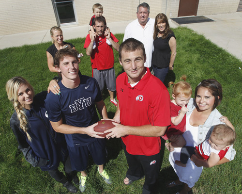 Al Hartmann  |  The Salt Lake Tribune
BYU's Drew Reilly and fiancee, Ashlyn, left, and Utah's Trevor Reilly and wife, Jessica, right, surrounded by their parents, Russ and Kris, back-right, and brother AJ with his wife, Bonnie, back-left, at a recent family gathering. Like the brothers, the family's allegiances will be divided when the Utes and Cougars meet in Provo on Saturday.