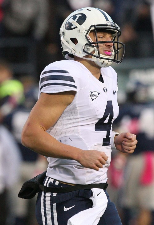 Leah Hogsten | The Salt Lake Tribune
Brigham Young Cougars quarterback Taysom Hill passed for 278 yards.  Brigham Young University Cougars defeated Utah State University Aggies 31-14, Friday, October 4, 2013 in Logan.