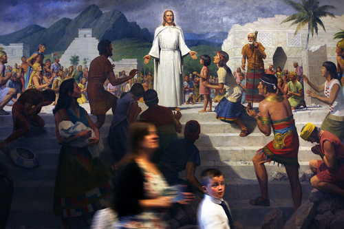 Scott Sommerdorf   |  The Salt Lake Tribune
Conference-goers blur past the painting "Christ Visits the Americas (3 Nephi 11:8)" as they go to their seats for the afternoon session of the 183rd LDS General Conference, Saturday, October 5, 2013.