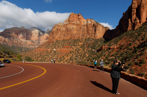 Trent Nelson  |  The Salt Lake Tribune
Visitors to Zion National Park take in the sights after the park opened on a limited basis Friday, October 11, 2013.